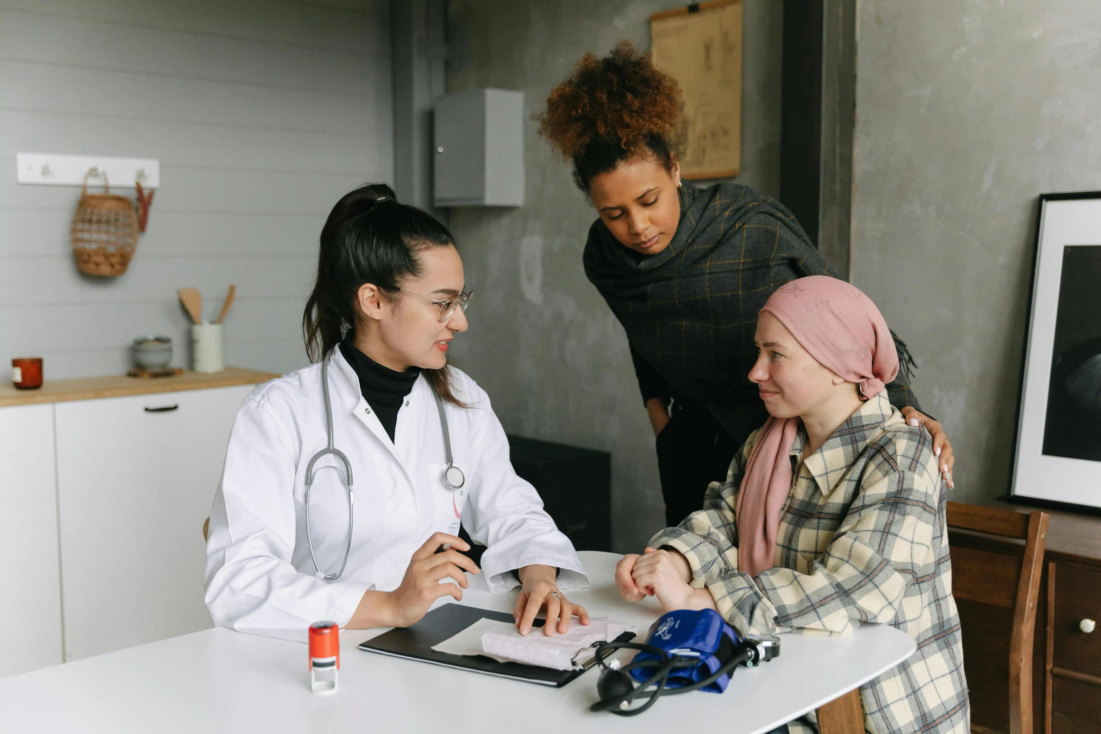 A patient with doctor and family member.
